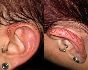 Stacey Blanchard - Ear Tattoo